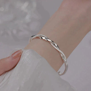 Sterling Silver Twisted Bracelet with Adjustable Geometric Design