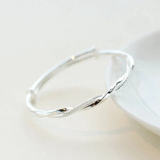 Sterling Silver Twisted Bracelet with Adjustable Geometric Design