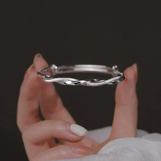 Sterling Silver Twisted Bracelet with Adjustable Geometric Design